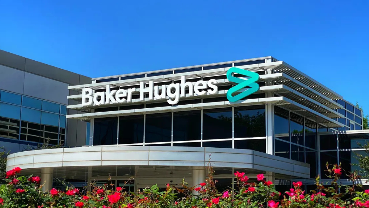 Baker Hughes headquarters exterior with signage and flowers in foreground.