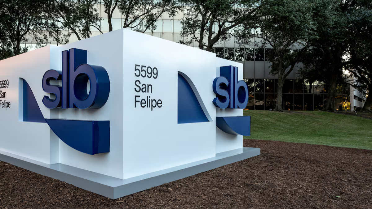 SLB headquarters monument sign reading 5599 San Felipe outside office building
